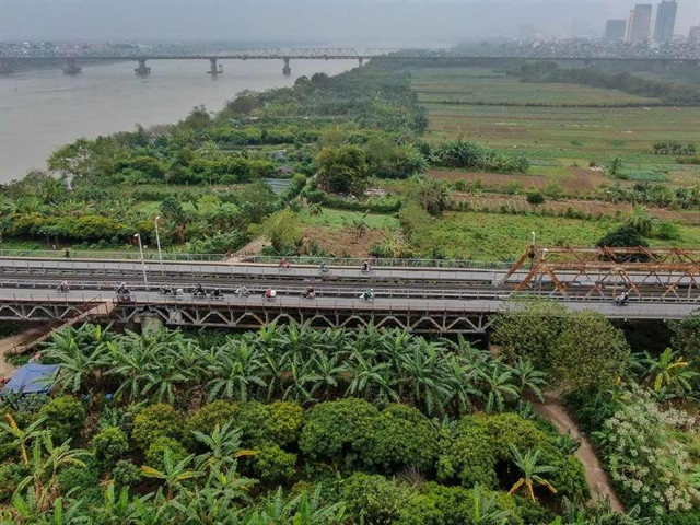 Turning Red River’s mudflats into green parks, community space