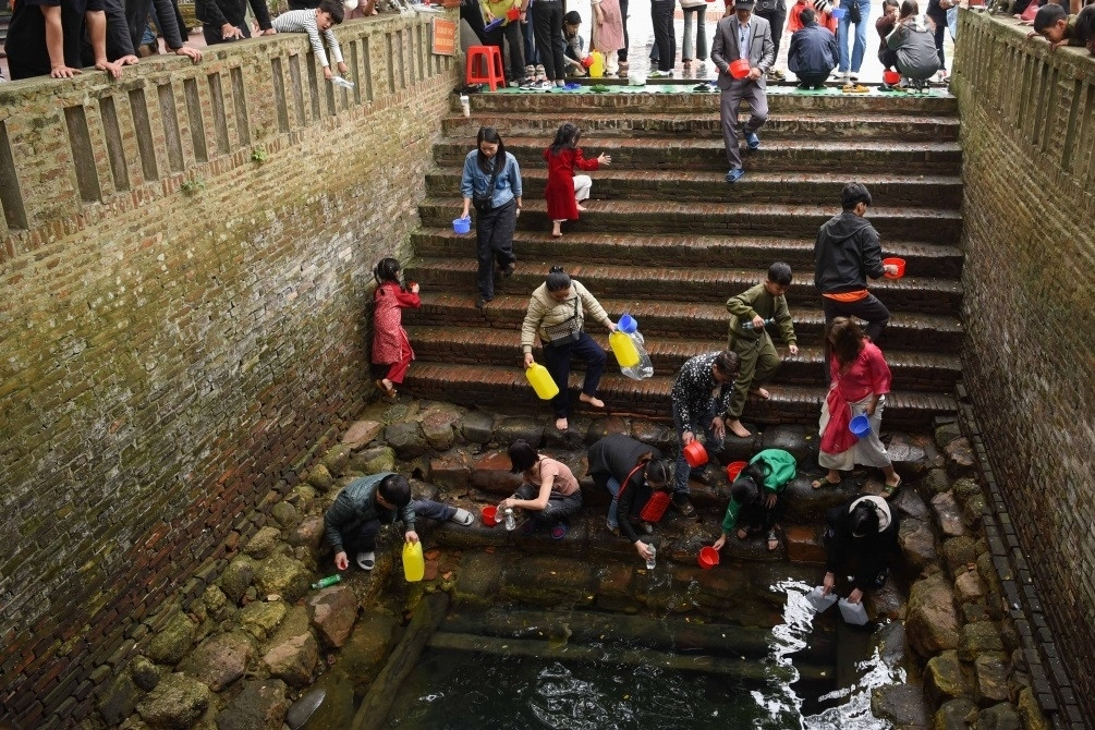 Praying for luck at Bac Ninh relic site