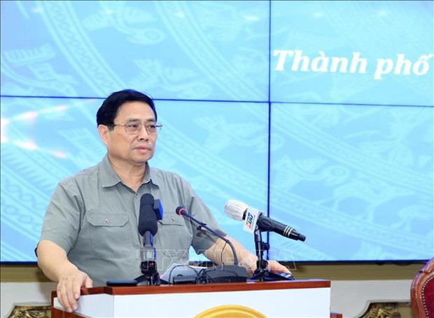 PM urges stronger implementation of special mechanisms for HCM City hinh anh 1