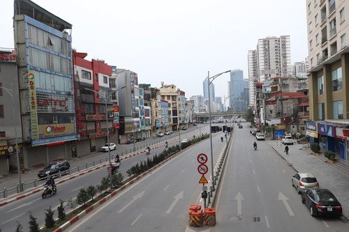 Chiều 30 Tết, đường phố Hà Nội vắng lặng, khác hẳn ngày thường