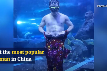 'Chàng tiên cá' mũm mĩm vẽ cơ bụng 6 múi, lắc lư gây sốt ở Trung Quốc