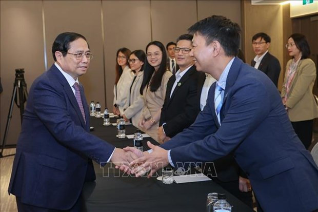 PM meets Vietnamese scientists, NZ business circle in New Zealand hinh anh 1