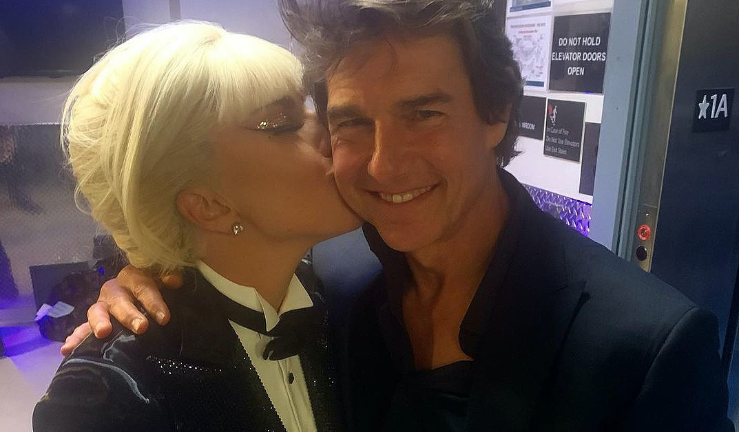 Lady Gaga embraces Tom Cruise backstage at the show
