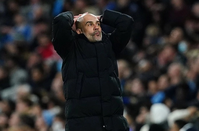 Pep Guardiola holds his head in regret, declaring Man City will eliminate Real Madrid