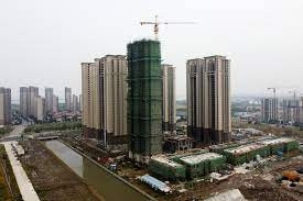 After 1 year of clamping down, China called on banks to support the real estate industry