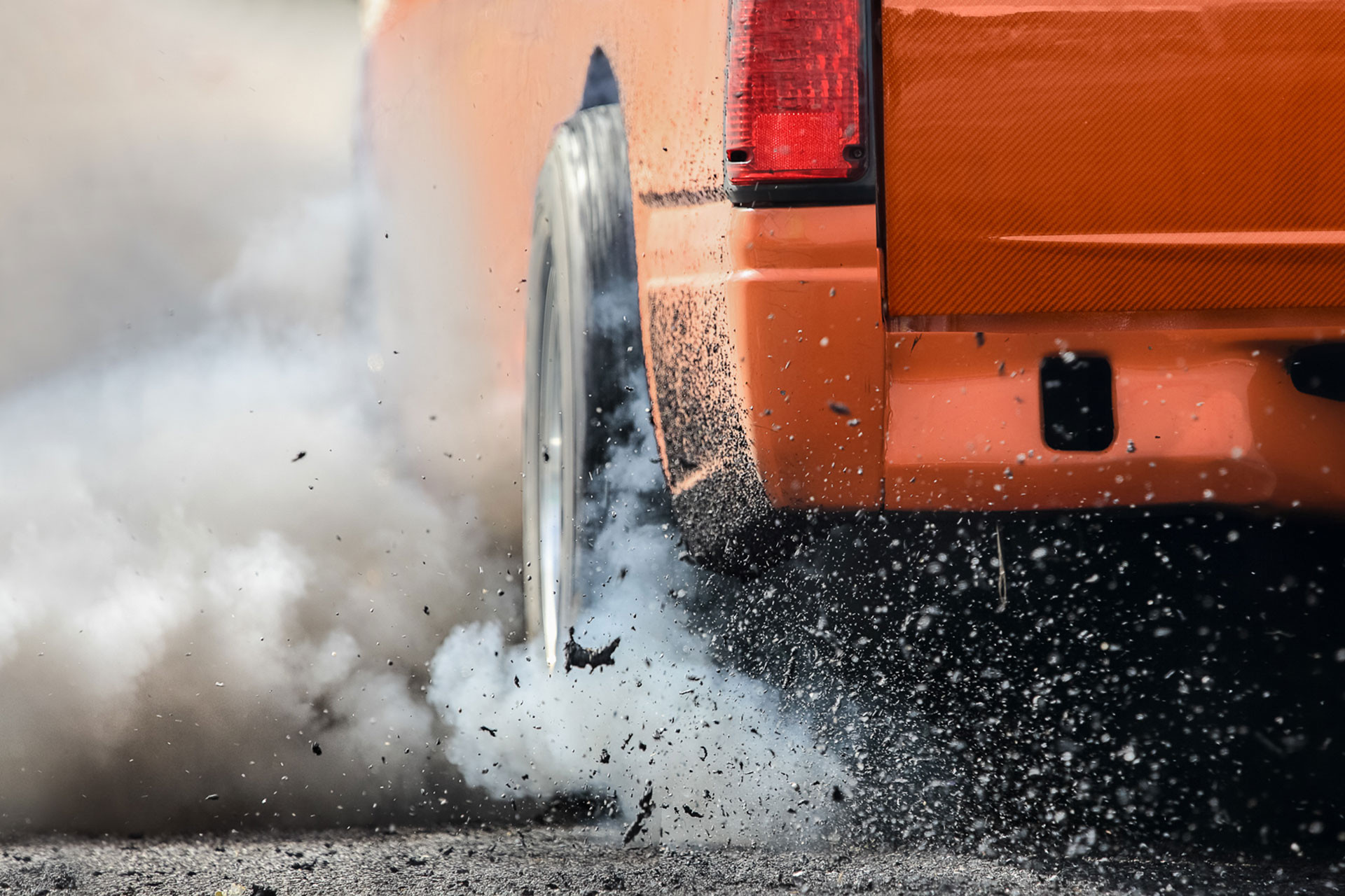 car drag racing burning tire iStock 1084509092.jpg