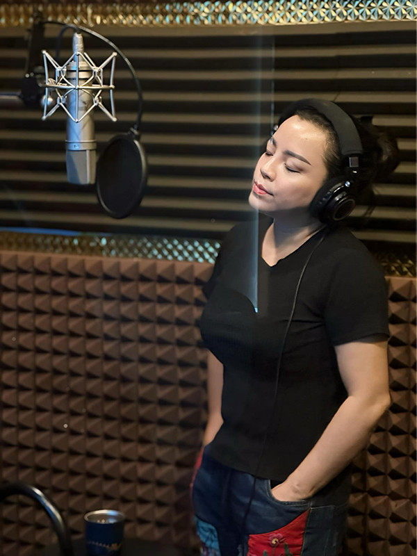 Nữ NSƯT xứ Nghệ nổi tiếng dòng nhạc đỏ có cuộc sống làm mẹ đơn thân bình dị - Ảnh 3.