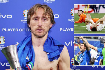 Khuôn mặt đau khổ của Luka Modric khi nhận giải cá nhân