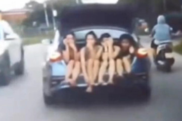 4 cô gái ngồi trong cốp ô tô lưu thông trên đường có vi phạm pháp luật?