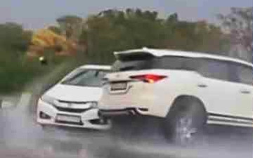 Toyota Fortuner và Honda City trượt bánh mất kiểm soát trên đường mưa ướt