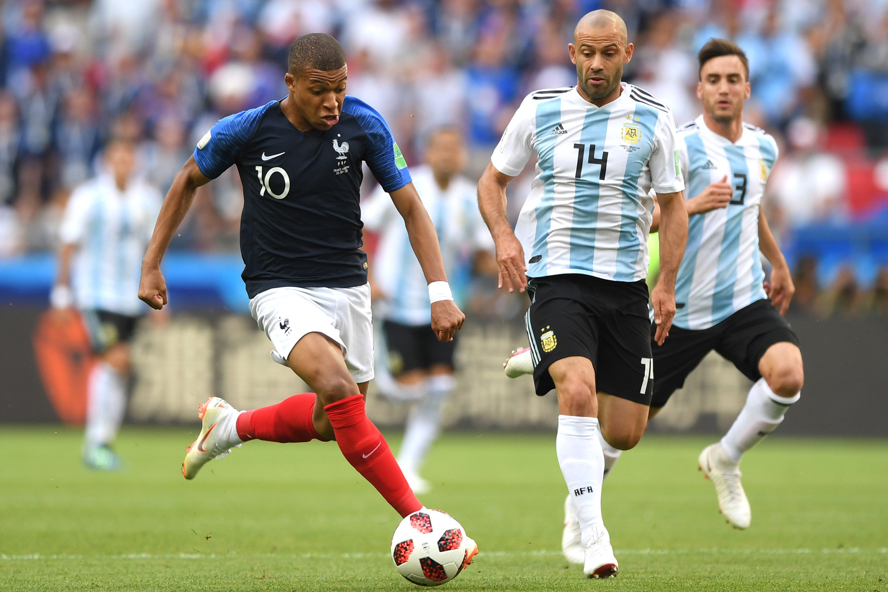 Mascherano Mbappe 2018.jpg