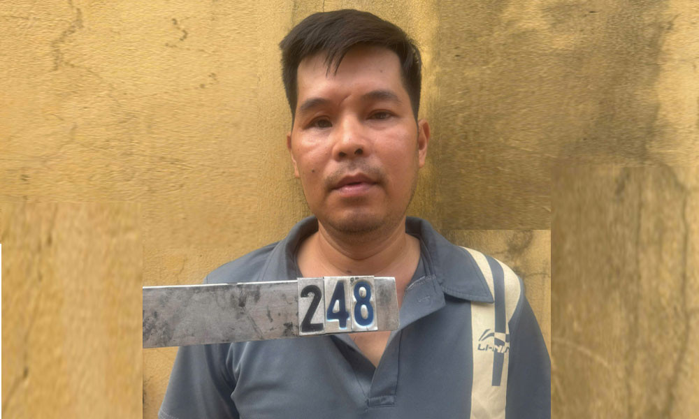 Trần Xuân Hùng tại cơ quan công an..jpg