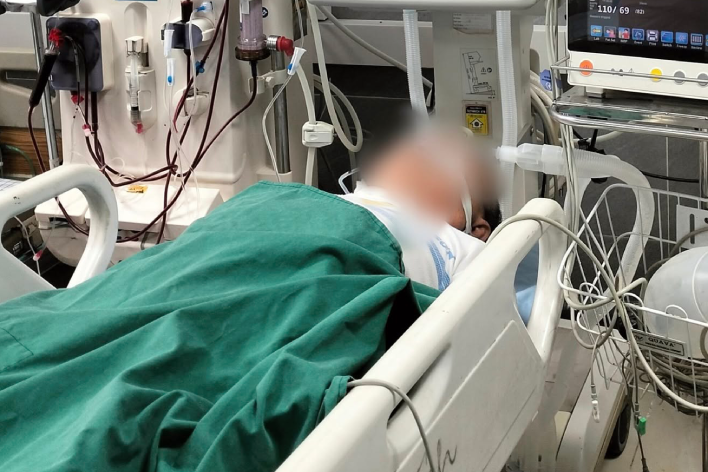 Người đàn ông hôn mê sâu sau khi uống vài chén rượu