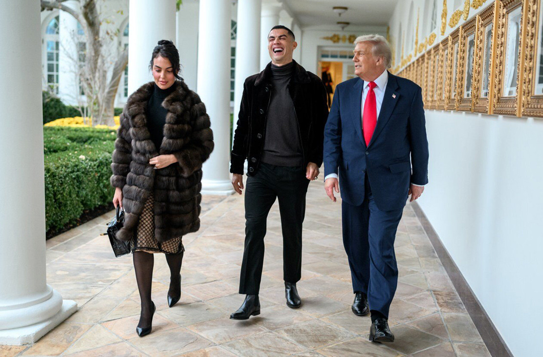 www_thesun_co_uk president donald trump walks cristiano 1039632242.jpg