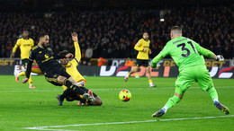 resources_premierleague_pulselive_com 2025 12 08T203203Z_1801732927_UP1ELC81L1D3I_RTRMADP_3_SOCCER ENGLAND WOL MUN (2).jpg