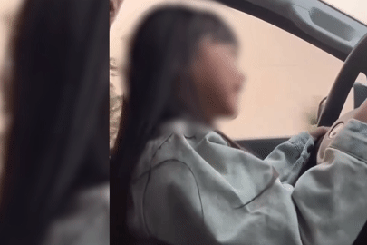 Xôn xao clip bố giao vô lăng ô tô cho bé gái cầm lái, chạy 60km/h