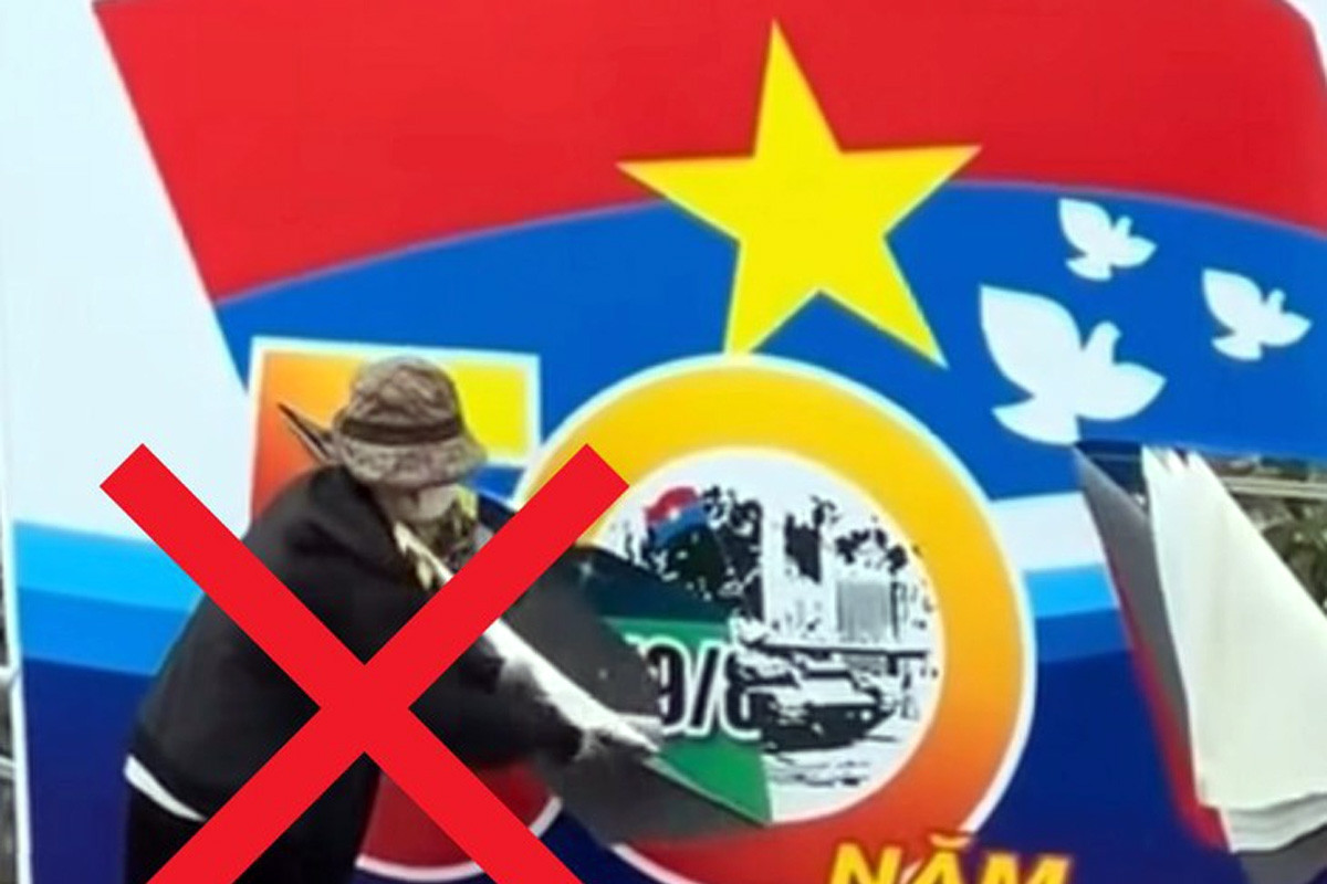 Công an vào cuộc vụ người phụ nữ cầm dao rạch biển pa nô chào mừng