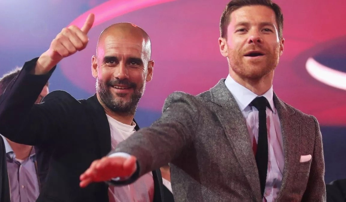Pep Guardiola Xabi Alonso Lars Baron.jpg