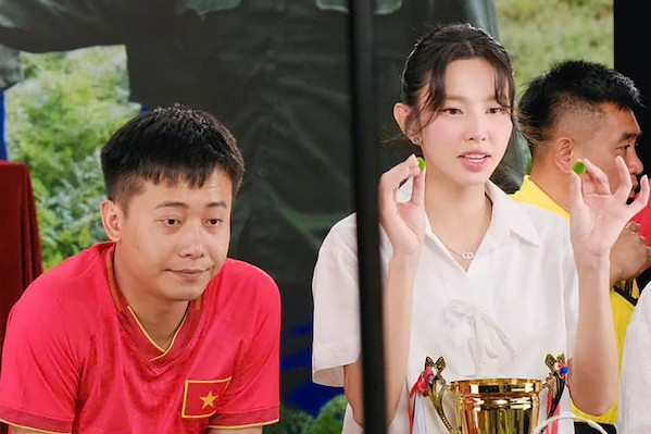 Vướng ồn ào bán kẹo rau với Quang Linh Vlogs, Thùy Tiên có bị tước vương miện?