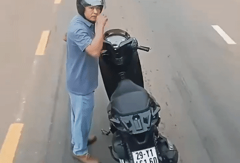 Người đàn ông chặn đầu ô tô, lớn tiếng 'biết bố mày là ai không?'