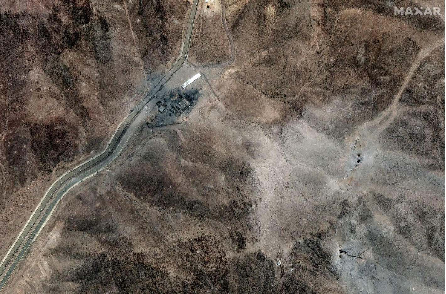 Ảnh vệ tinh cho thấy căn cứ Fordow của Iran bị tàn phá sau cuộc tấn công của Mỹ. Ảnh: Maxar