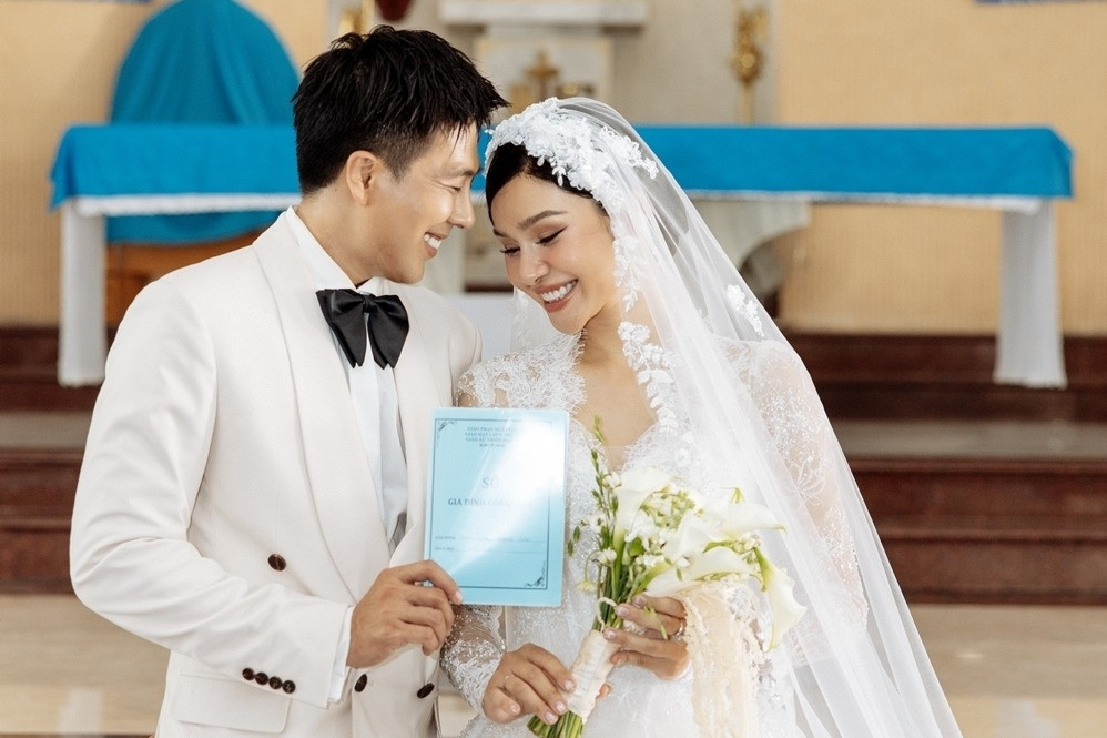 Người mẫu Lê Thu Trang và diễn viên Quang Sơn kết hôn sau 5 năm qua bao sóng gió