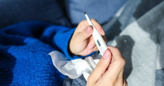 Nguy cơ gia tăng mắc bệnh cúm trong thời tiết mưa nắng thất thường