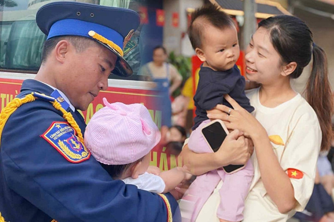 Vợ bế con 9 tháng tuổi chờ chồng diễu binh, giây phút gặp mặt vỡ òa hạnh phúc
