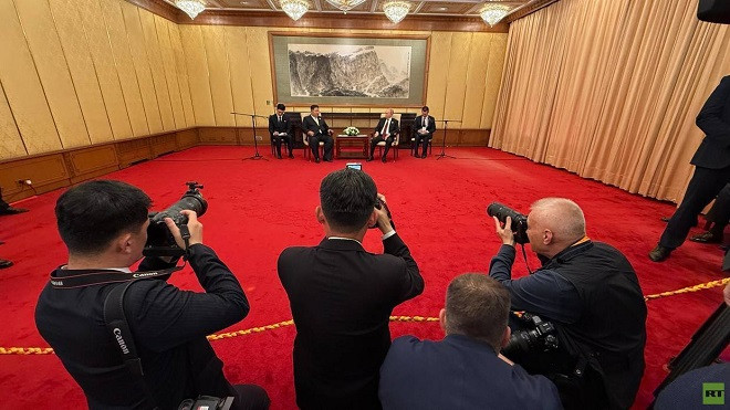 putin hoi dam kim jong un.jpg