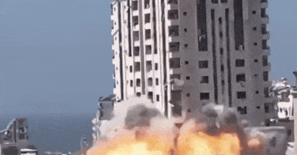Israel đánh sập nhà cao tầng ở Gaza City, cảnh báo cứng rắn Hamas