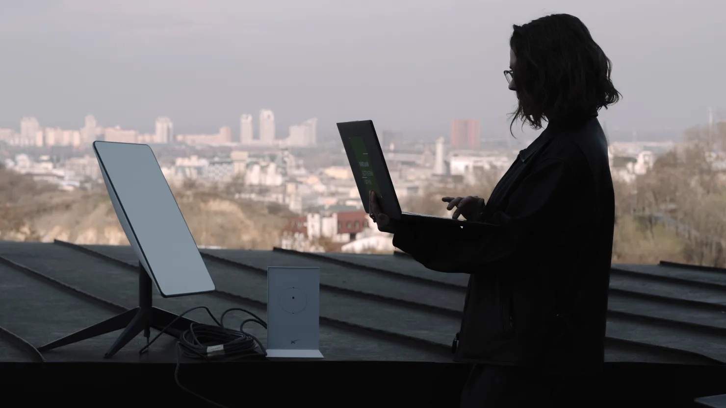 A Ukrainian uses a Starlink satellite-internet communication system on a rooftop in Kyiv, Ukraine, March 11, 2025. Bloomberg