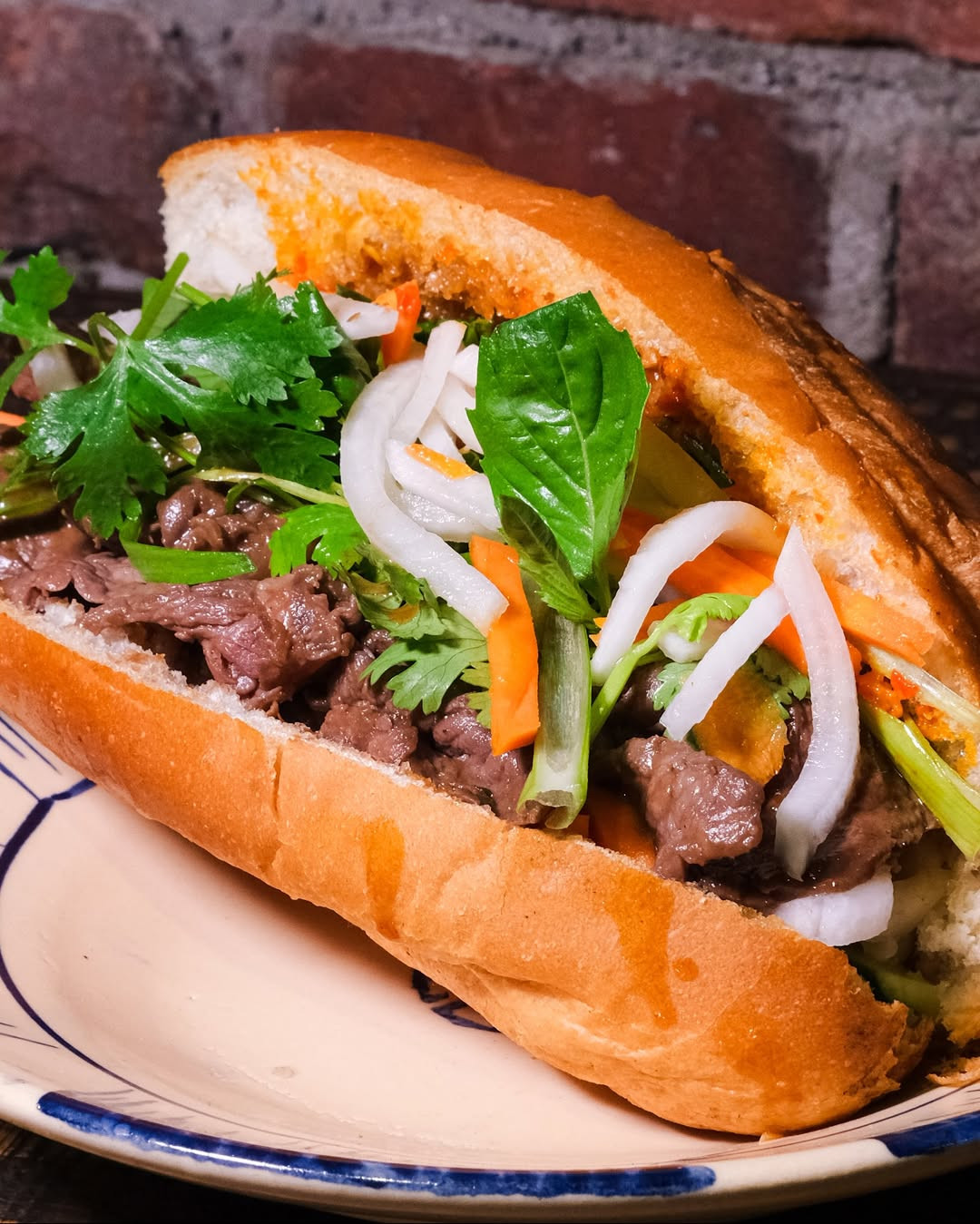 Bánh Mì Bò Nướng with Grilled Ribeye SteakCrispy, smoky, and perfectly caramelized from our char.jpg