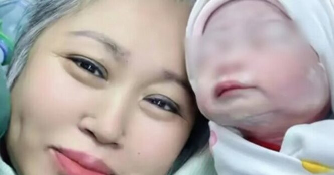 Sinh con ở tuổi 63, cặp vợ chồng tóc bạc vỡ òa hạnh phúc