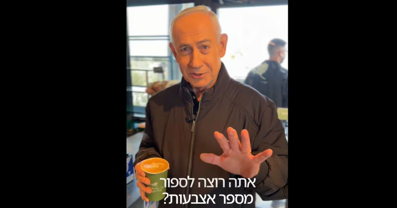 Phía sau video Thủ tướng Israel uống cà phê, ‘khoe’ 5 ngón tay