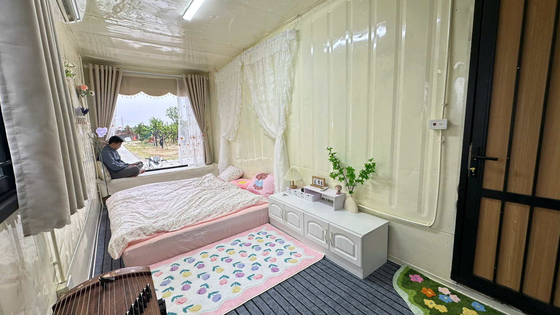 vo chong HN lam nha container o ngoai o.jpg