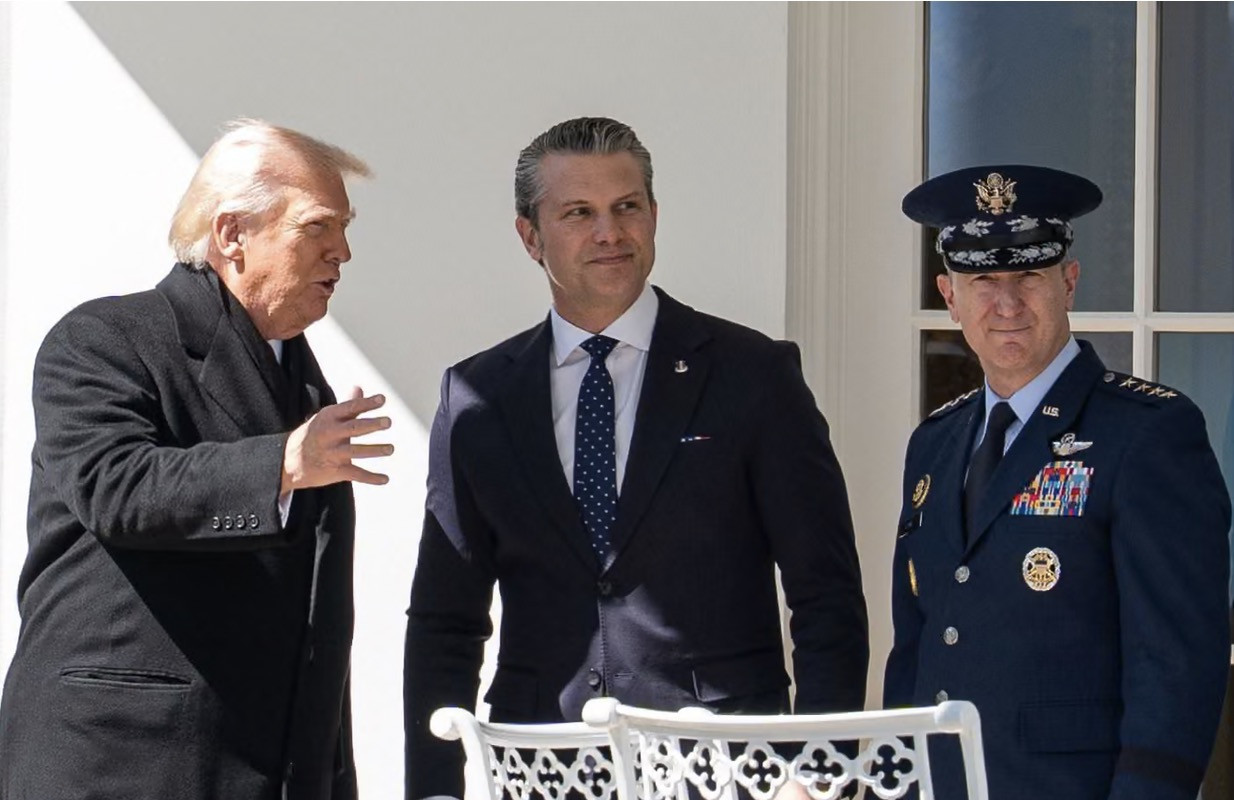 Donald Trump, Pete Hegseth and US Air Force General Dan Caine. Photograph: Aaron Schwartz/Pool/Aaron Schwartz - Pool/CNP/Shutterstock