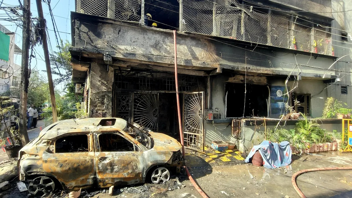 the burned out car and house_0cc8efdeab.webp