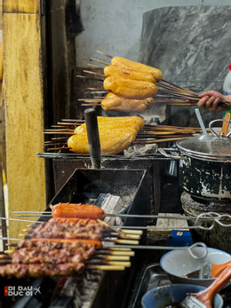 https://static-images.vnncdn.net/vps_images_publish/000001/000003/2026/3/28/banh-mi-nuong-lang-son-0-2458.jpg
