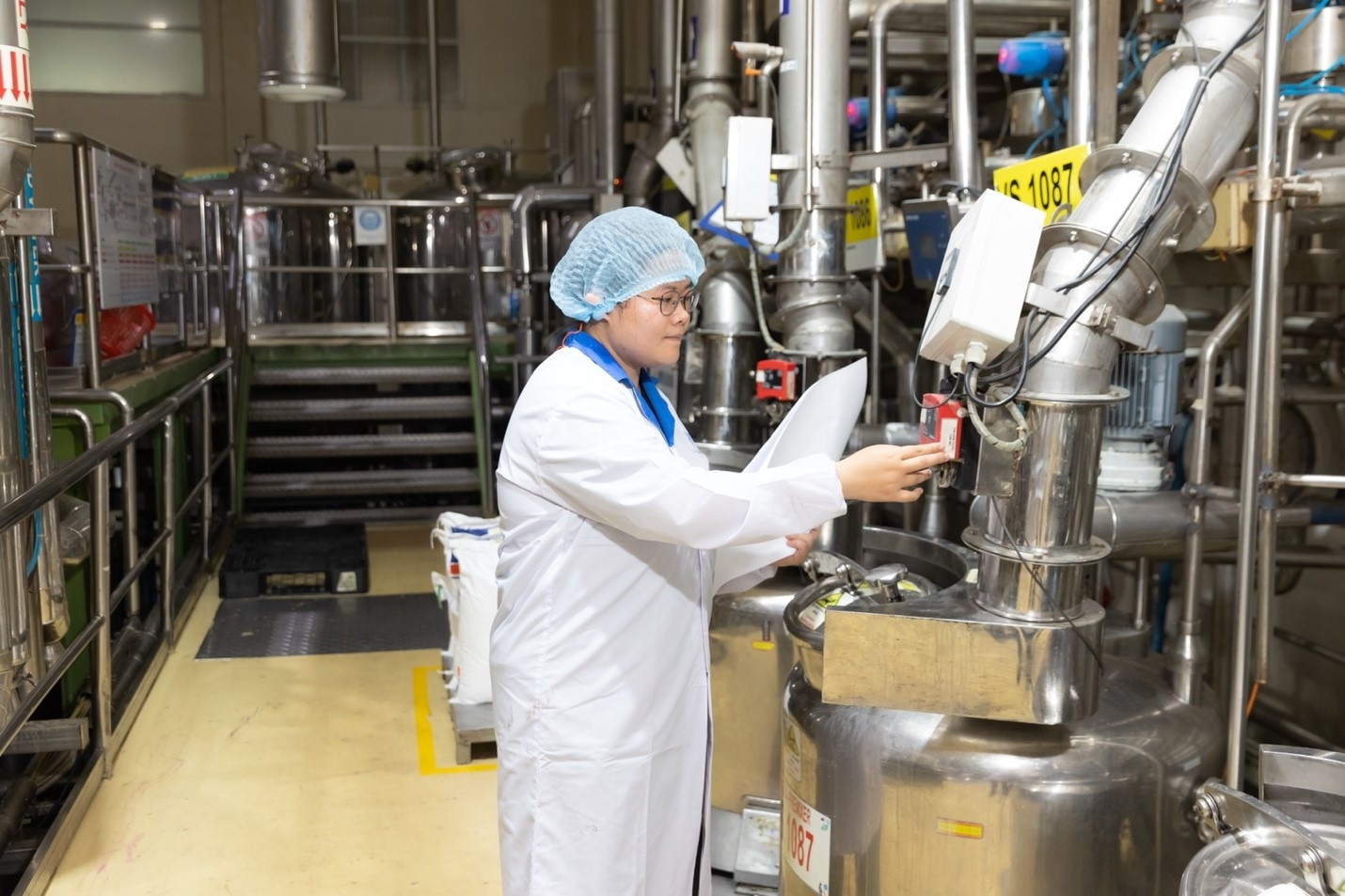 ‘Bản thiết kế’ phía sau những người phụ nữ tự tin nơi dây chuyền sản xuất