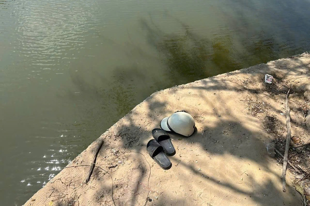 Phát hiện thi thể nam thanh niên dưới đập nước, đồ cá nhân để lại trên bờ.jpg