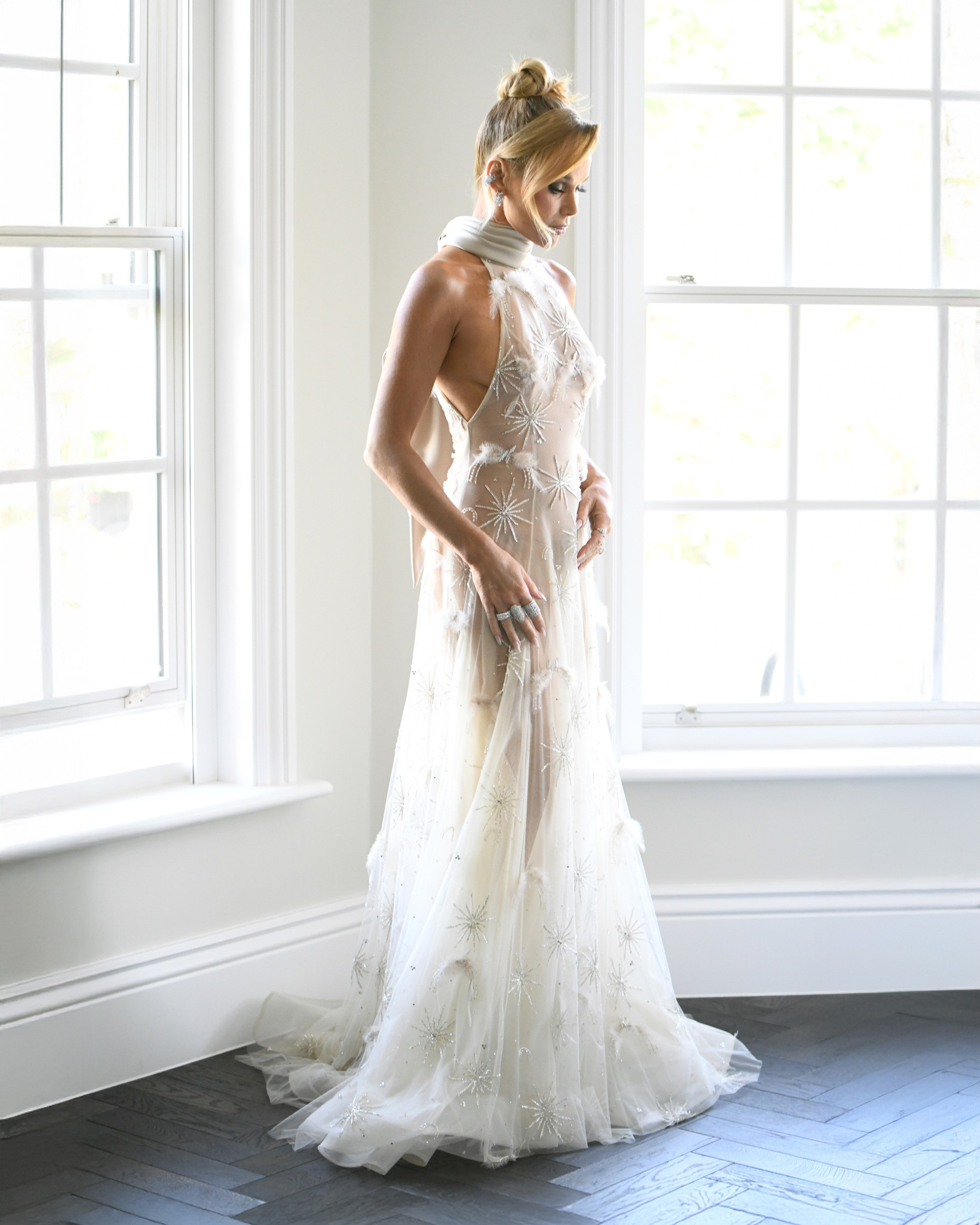 https://static-images.vnncdn.net/vps_images_publish/000001/000003/2026/5/10/photo-shared-by-amanda-holden-on-may-09-2026-tagging-basilsodaworld-may-be-an-image-of-gown-dress-wedding-and-text-1155.jpeg