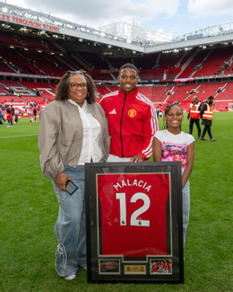 www_thesun_co_uk tyrell malacia manchester united family 1081671287.jpg