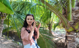 https://static-images.vnncdn.net/vps_images_publish/000001/000003/2026/5/5/khach-tay-du-lich-vinh-long-8-1613.png