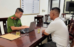 công an làm việc với anh Đ.jpg
