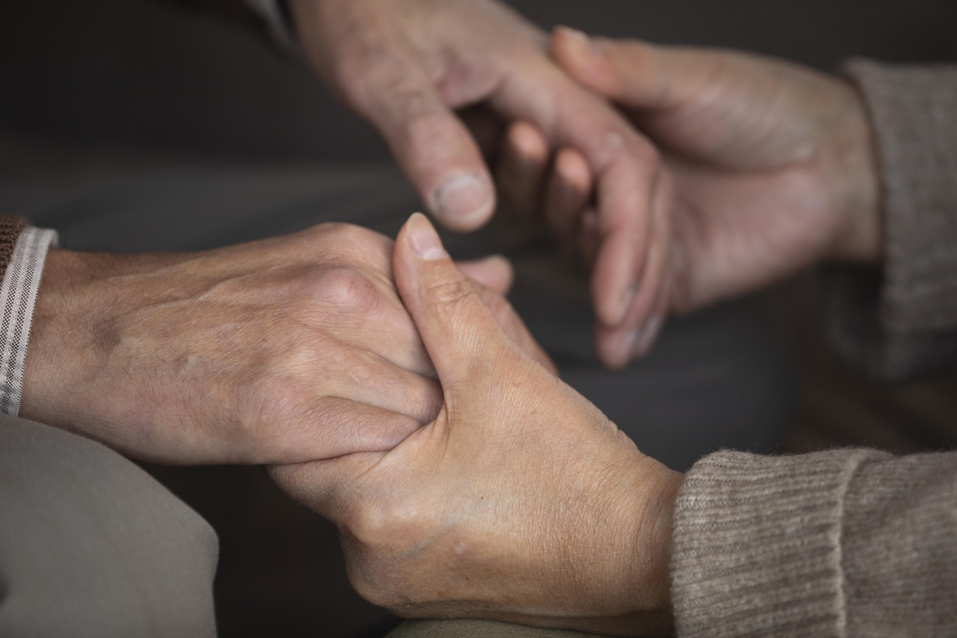 close up senior couple holding hands.jpg