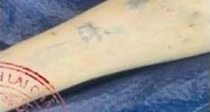 Cảnh sát truy tìm lai lịch thi thể có hình xăm vương miện trên cánh tay