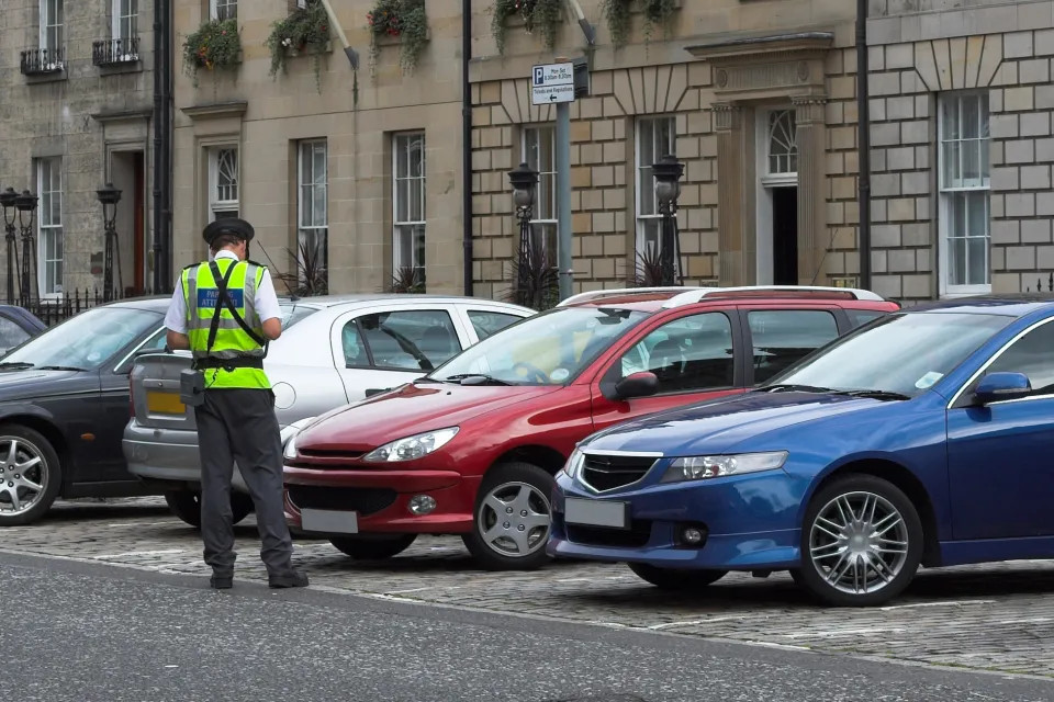 parking attendant traffic.webp