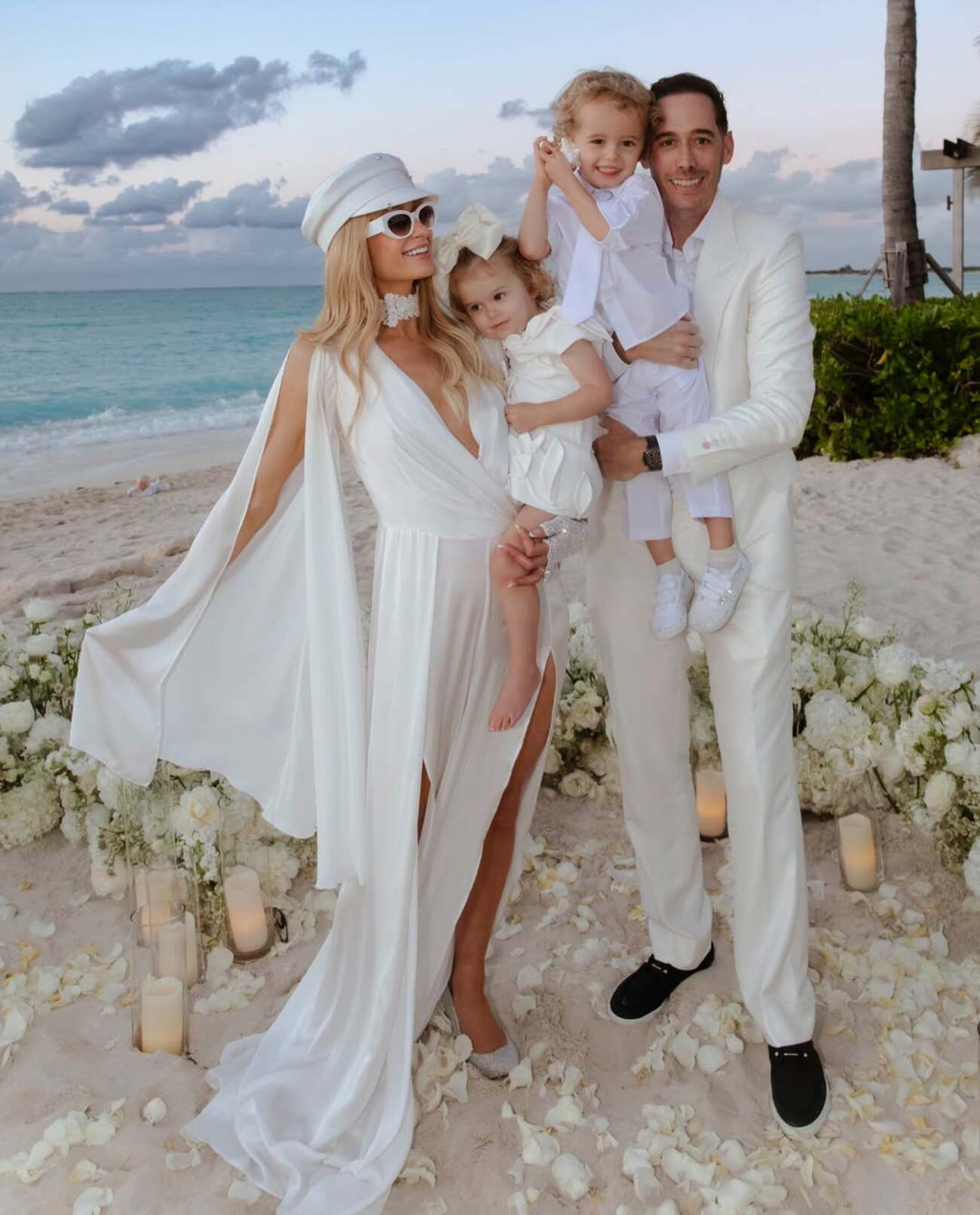 Photo shared by Paris Hilton on June 21, 2026 tagging camraface, and 11.11media. May be an image of gown, wedding and text.jpeg