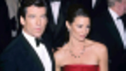 pierce bosnan and keely shaye smith in 1995 scaled.jpg.webp