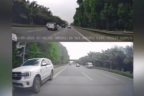 Xe Ford Everest vượt ở làn khẩn cấp rồi bất ngờ dừng lại chặn đầu xe khác